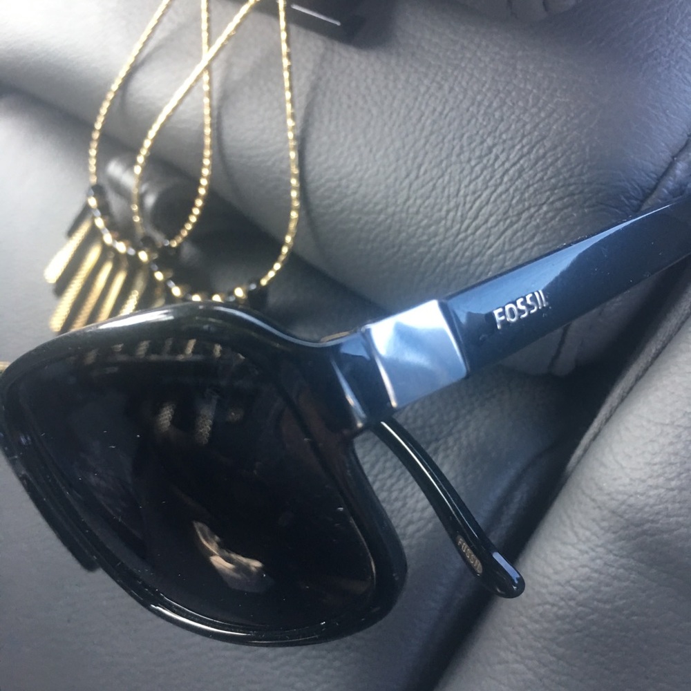 Beautiful earrings plus fossil sunglases for him..